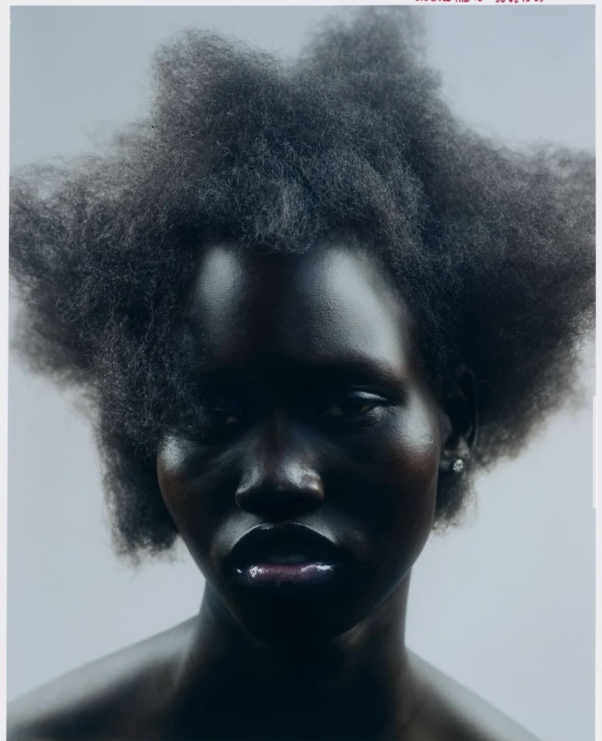 Fashion model in grey coat